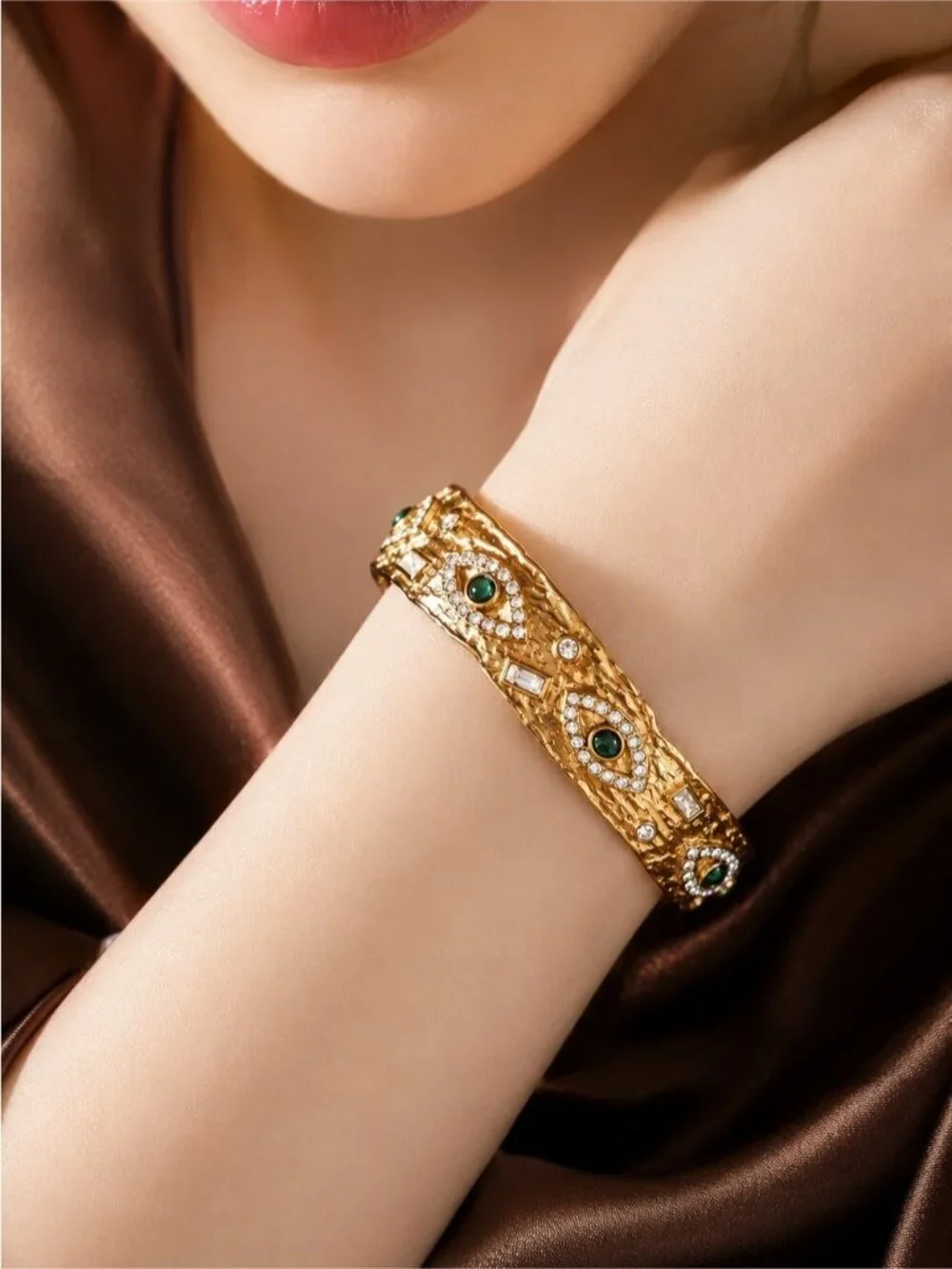 Gold plated Cuff Bracelet with Green Eye Accents